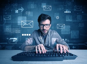 A talented young hacker hacking email address passwords concept with keyboard on desk and illustrated letters in the background-3