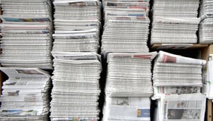 stacks of newspapers-1