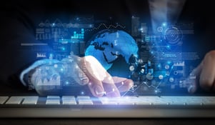 Business-person typing on keyboard with global system concept-3