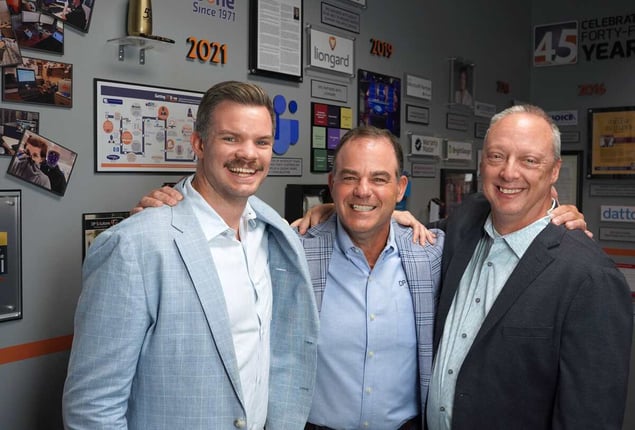 Joe, Ken, and Ron smiling at DP Solutions