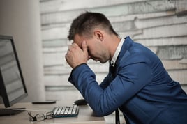 bigstock-Tired-Business-Man-At-Workplace